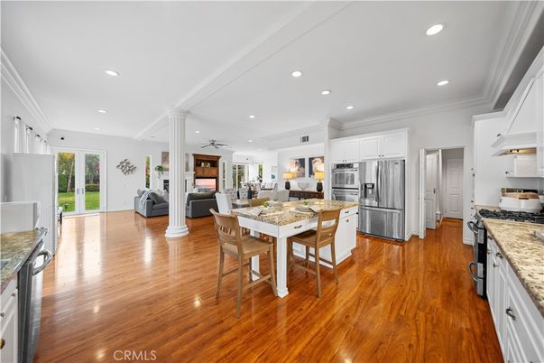 Dining room, Interior, Kitchen, Recessed Lighting, Stainless Steel Appliances, Wood Texture Flooring