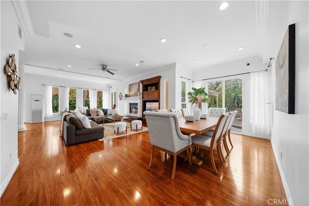 Dining room, Fireplace, Interior, Living room, Recessed Lighting, Wood Texture Flooring