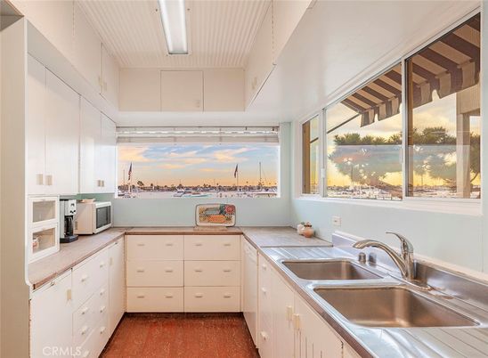 Interior, Kitchen, Tile Countertops, Water, Wood Texture Flooring
