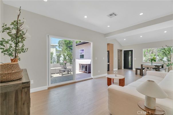 Dining room, Fireplace, Interior, Living room, Recessed Lighting, Wood Texture Flooring