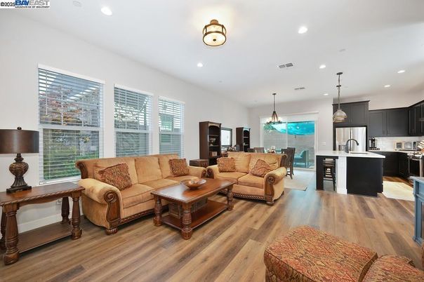 Dining room, Interior, Kitchen, Living room, Pendant Lights, Recessed Lighting, Stainless Steel Appliances, Wood Texture Flooring
