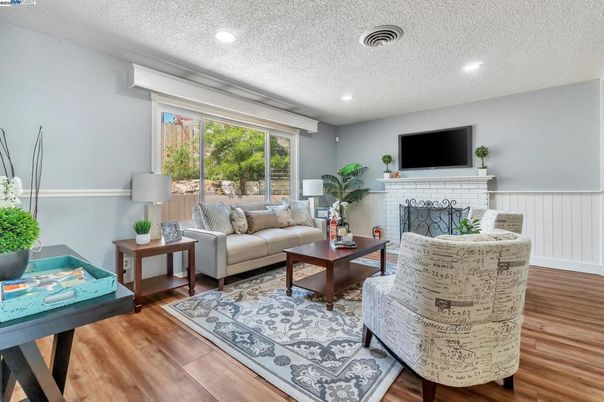 Fireplace, Interior, Living room, Recessed Lighting, Wood Texture Flooring