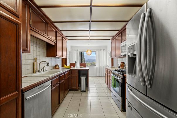 Interior, Kitchen, Pendant Lights, Stainless Steel Appliances, Tile Countertops