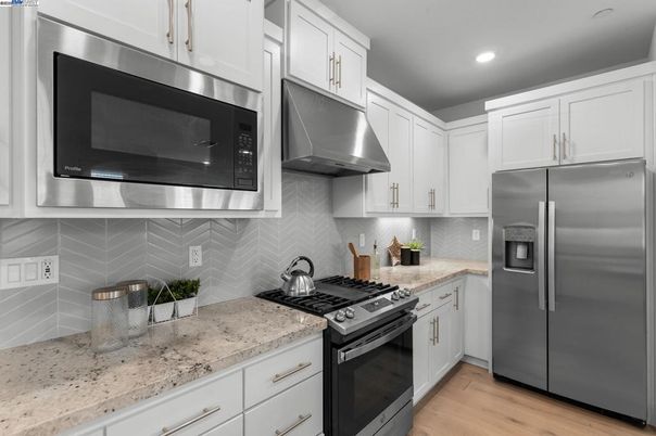 Interior, Kitchen, Recessed Lighting, Stainless Steel Appliances, Wood Texture Flooring