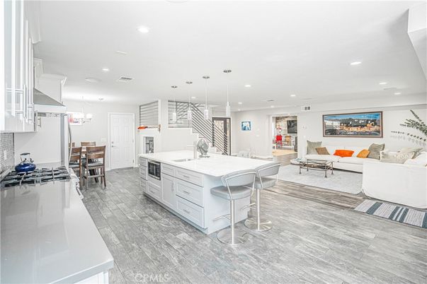 Chandelier, Dining room, Interior, Kitchen, Living room, Pendant Lights, Recessed Lighting, Wood Texture Flooring