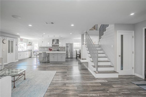 Dining room, Interior, Kitchen, Pendant Lights, Recessed Lighting, Stainless Steel Appliances, Wood Texture Flooring