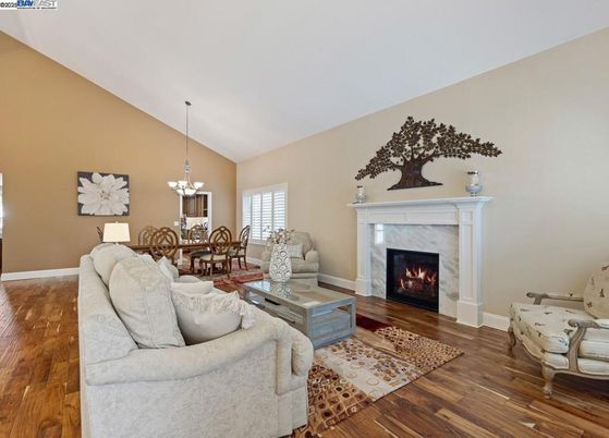 Chandelier, Dining room, Fireplace, Interior, Living room, Wood Texture Flooring