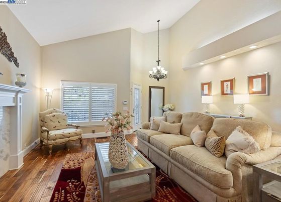 Chandelier, Fireplace, Interior, Living room, Pendant Lights, Recessed Lighting, Wood Texture Flooring