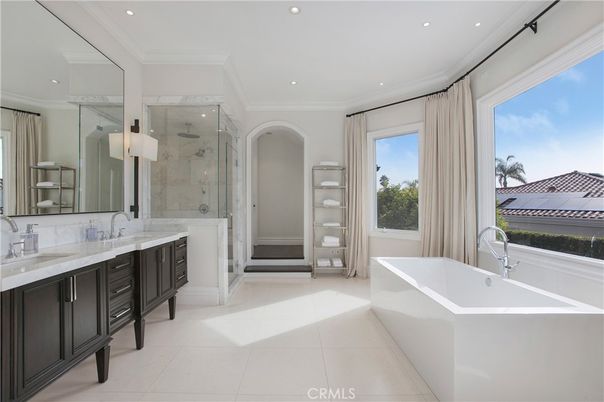 Bathroom, Dual Sink Vanities, Free Standing Baths, Glass Shower, Interior, Marble Walls, Recessed Lighting
