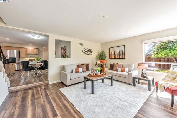 Dining room, Interior, Kitchen, Living room, Recessed Lighting, Stainless Steel Appliances, Wood Texture Flooring