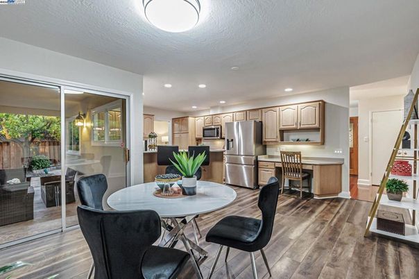 Dining room, Interior, Kitchen, Recessed Lighting, Stainless Steel Appliances, Wood Texture Flooring