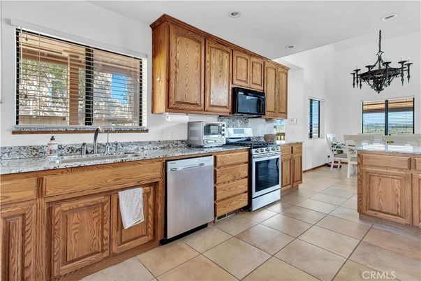 Chandelier, Dining room, Interior, Kitchen, Recessed Lighting, Stainless Steel Appliances
