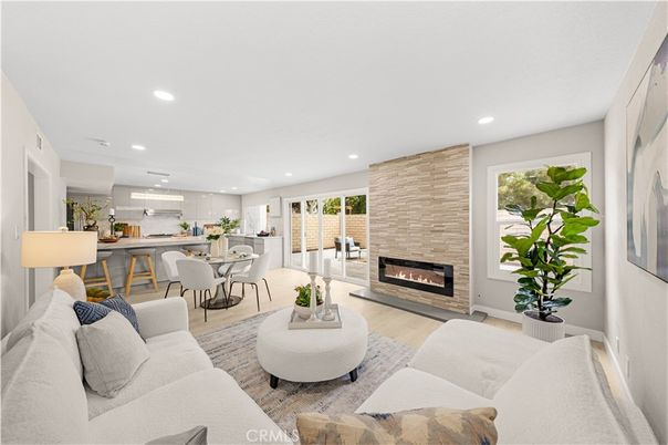 Dining room, Fireplace, Interior, Kitchen, Living room, Recessed Lighting, Stone Walls, Wood Texture Flooring