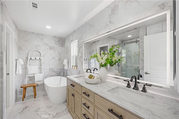 Bathroom, Dual Sink Vanities, Free Standing Baths, Glass Shower, Interior, Marble, Marble Walls, Recessed Lighting
