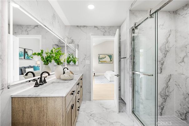 Bathroom, Dual Sink Vanities, Glass Shower, Interior, Marble, Marble Walls, Recessed Lighting