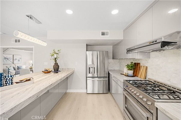 Interior, Kitchen, Pendant Lights, Recessed Lighting, Stainless Steel Appliances, Wood Texture Flooring
