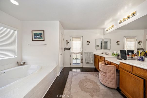 Bathroom, Dual Sink Vanities, Interior, Recessed Lighting, Tile Countertops, Wood Texture Flooring