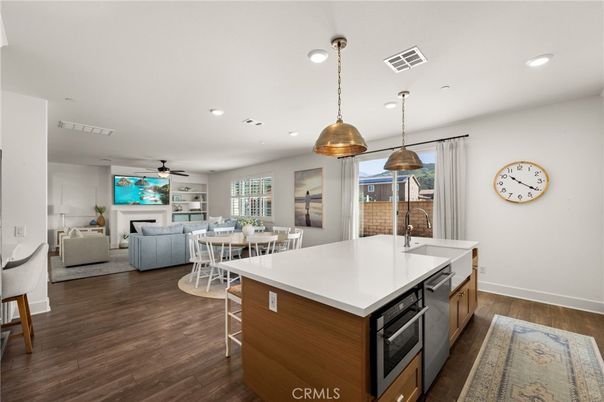 Dining room, Fireplace, Interior, Kitchen, Living room, Pendant Lights, Recessed Lighting, Wood Texture Flooring