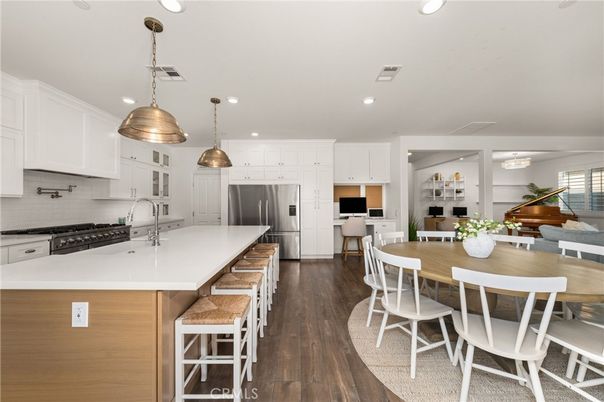 Dining room, Interior, Kitchen, Pendant Lights, Recessed Lighting, Stainless Steel Appliances, Wood Texture Flooring