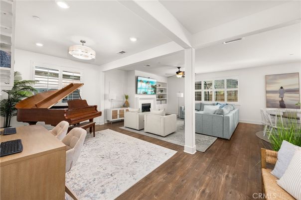 Fireplace, Interior, Living room, Piano, Recessed Lighting, Wood Texture Flooring