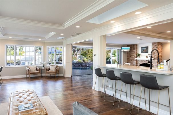 Fireplace, Interior, Kitchen, Living room, Recessed Lighting, Stone Walls, Wood Texture Flooring