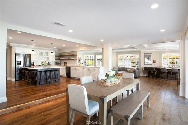 Dining room, Interior, Kitchen, Pendant Lights, Recessed Lighting, Stainless Steel Appliances, Wood Texture Flooring