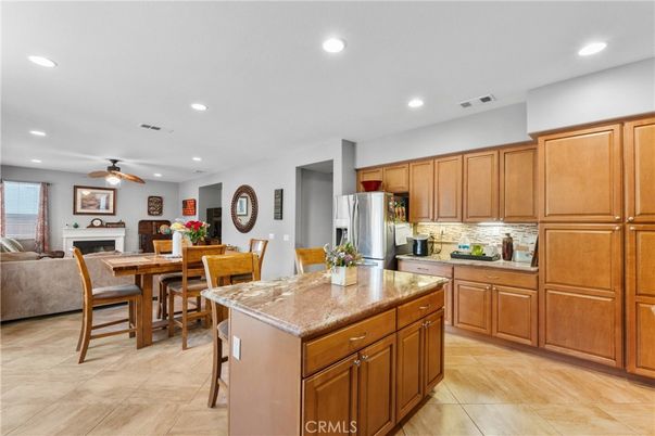 Dining room, Fireplace, Interior, Kitchen, Living room, Recessed Lighting, Stainless Steel Appliances