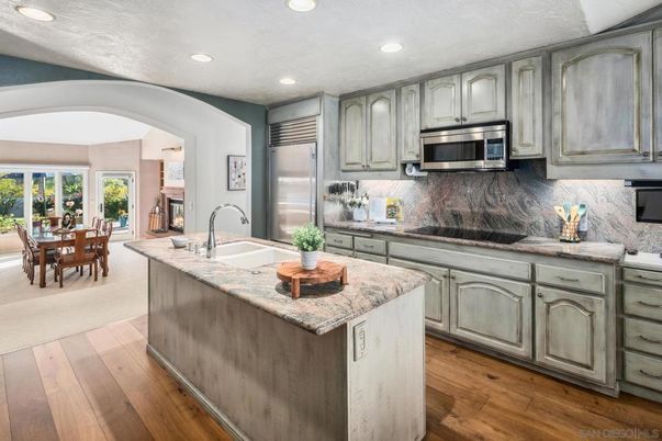 Dining room, Interior, Kitchen, Recessed Lighting, Stainless Steel Appliances, Wood Texture Flooring