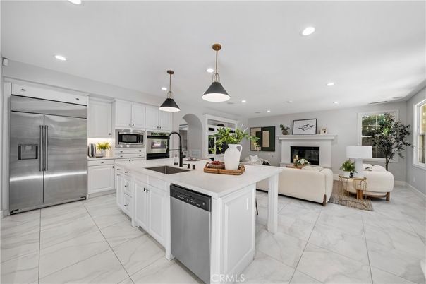 Fireplace, Interior, Kitchen, Living room, Pendant Lights, Recessed Lighting, Stainless Steel Appliances