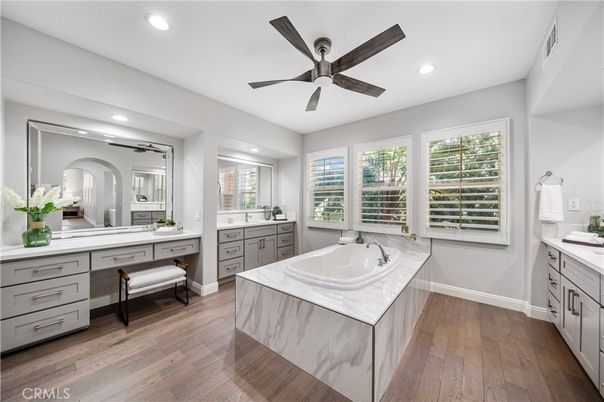 Bathroom, Dual Sink Vanities, Interior, Recessed Lighting, Wood Texture Flooring