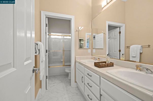 Bathroom, Dual Sink Vanities, Glass Shower, Interior, Marble, Tile Countertops