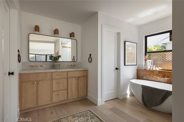 Bathroom, Dual Sink Vanities, Free Standing Baths, Interior, Recessed Lighting, Wood Texture Flooring