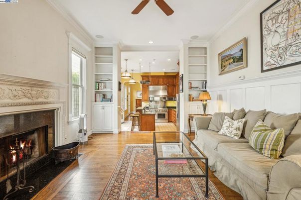 Fireplace, Interior, Kitchen, Living room, Pendant Lights, Recessed Lighting, Stainless Steel Appliances, Wood Texture Flooring