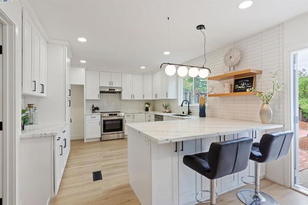 Interior, Kitchen, Pendant Lights, Recessed Lighting, Stainless Steel Appliances, Wood Texture Flooring