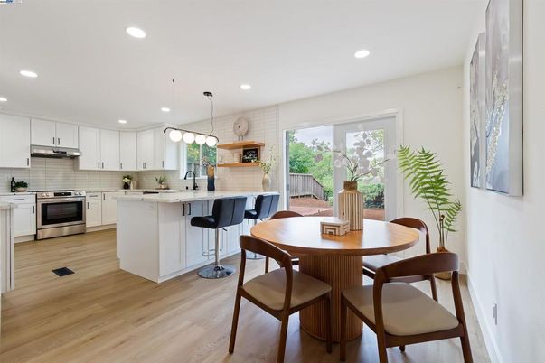 Dining room, Interior, Kitchen, Pendant Lights, Recessed Lighting, Stainless Steel Appliances, Wood Texture Flooring