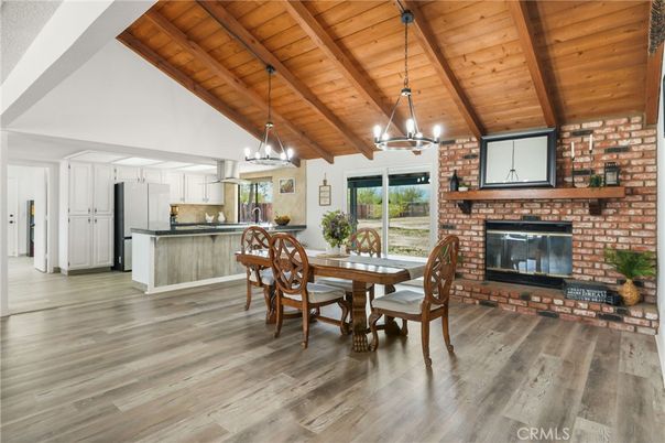Dining room, Fireplace, Interior, Kitchen, Pendant Lights, Stainless Steel Appliances, Stone Walls, Wooden Beams, Wooden Ceilings, Wood Texture Flooring