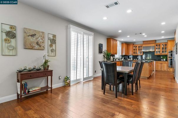 Dining room, Interior, Kitchen, Recessed Lighting, Stainless Steel Appliances, Wood Texture Flooring