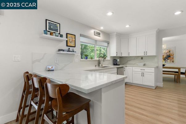 Interior, Kitchen, Marble Walls, Recessed Lighting, Wood Texture Flooring