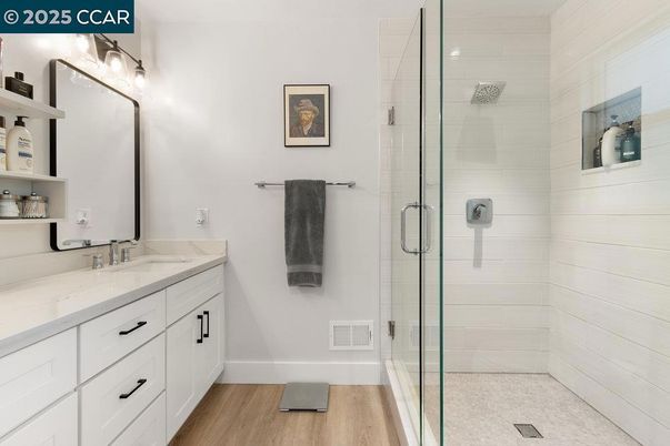 Bathroom, Dual Sink Vanities, Glass Shower, Interior, Wood Texture Flooring