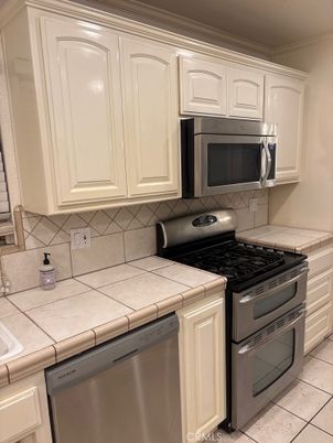 Interior, Kitchen, Stainless Steel Appliances, Tile Countertops