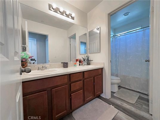 Bathroom, Dual Sink Vanities, Glass Shower, Interior, Wood Texture Flooring