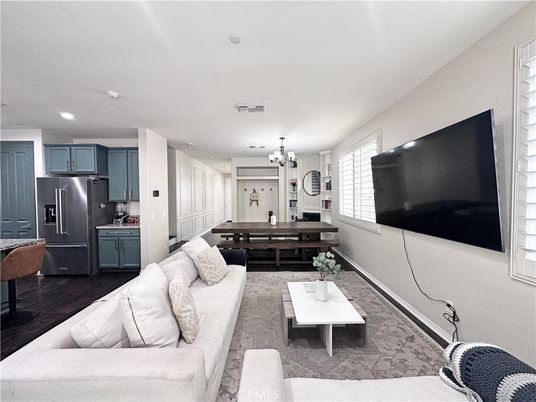 Chandelier, Dining room, Interior, Kitchen, Living room, Recessed Lighting, Stainless Steel Appliances, Wood Texture Flooring