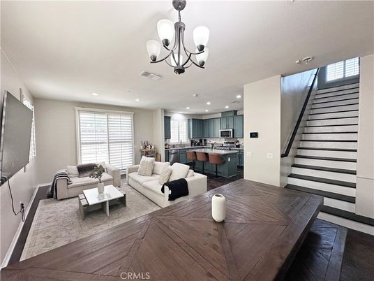 Chandelier, Dining room, Interior, Kitchen, Living room, Recessed Lighting, Stainless Steel Appliances, Wood Texture Flooring