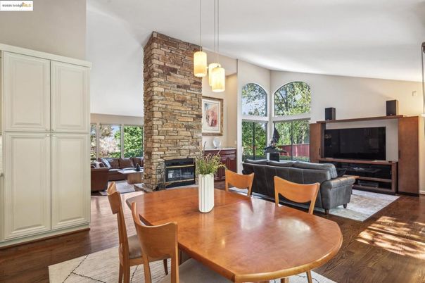 Dining room, Fireplace, Interior, Living room, Pendant Lights, Stone Walls, Wood Texture Flooring