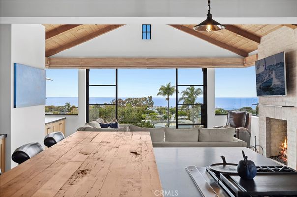Dining room, Fireplace, Interior, Living room, Water, Wooden Beams, Wooden Ceilings, Wood Texture Flooring