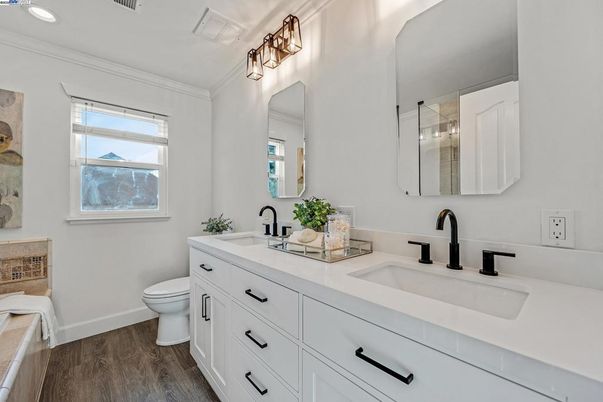 Bathroom, Dual Sink Vanities, Interior, Recessed Lighting, Wood Texture Flooring
