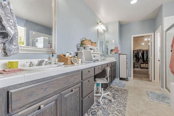 Bathroom, Dual Sink Vanities, Interior, Recessed Lighting, Tile Countertops