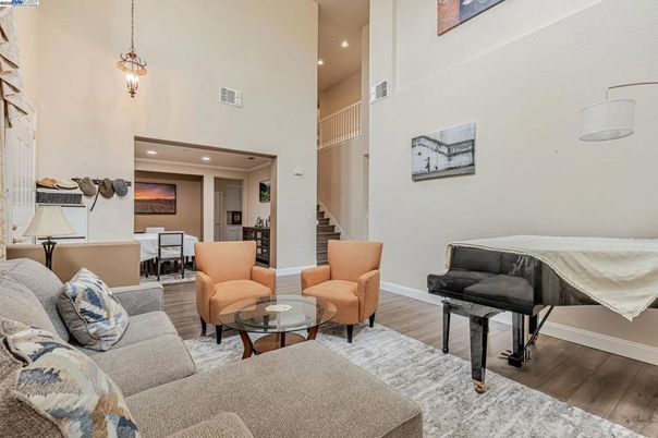 Dining room, Interior, Living room, Pendant Lights, Piano, Recessed Lighting, Wood Texture Flooring