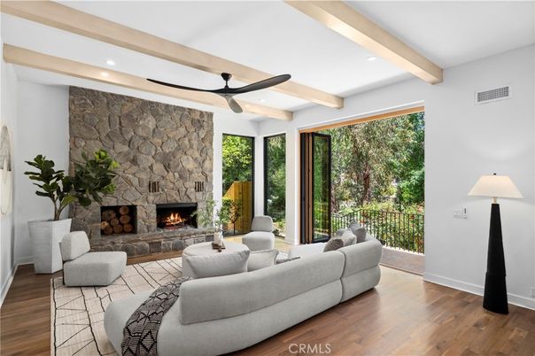 Fireplace, Interior, Living room, Recessed Lighting, Stone Walls, Wooden Beams, Wood Texture Flooring