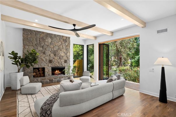 Fireplace, Interior, Living room, Recessed Lighting, Stone Walls, Wooden Beams, Wood Texture Flooring